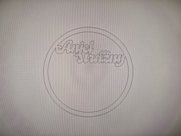 Brand logo: circular emblem with two concentric rings and the cursive words 'Angel Whimity' inside the looped text.